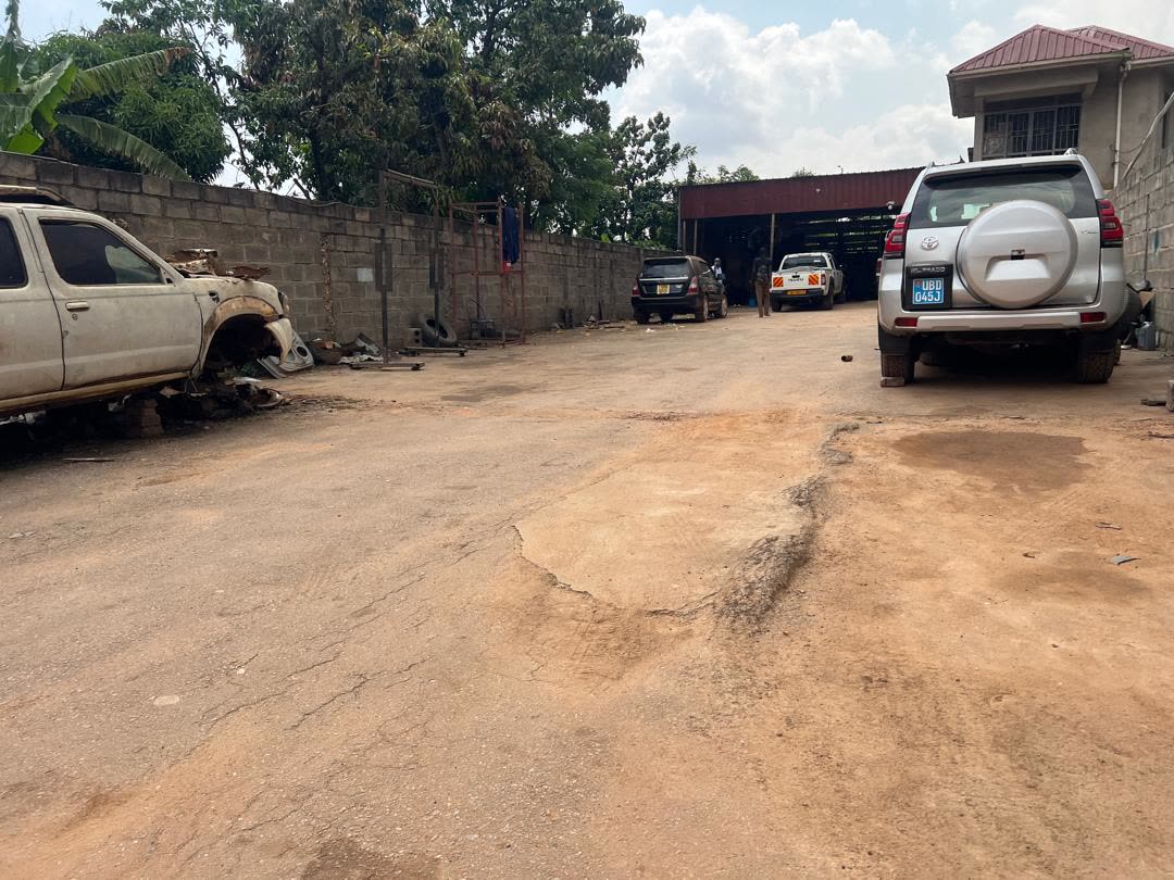 Pickup truck raised for service at Lawrebac Auto Garage