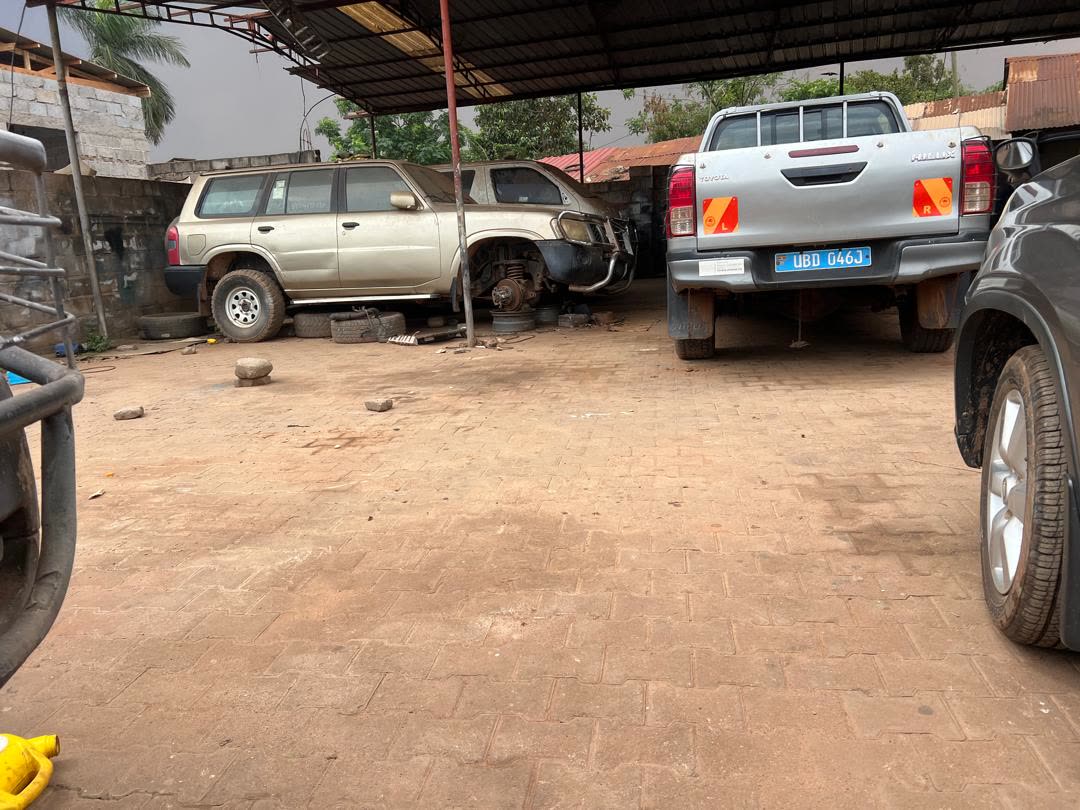 Service vehicle inside Lawrebac Auto Garage